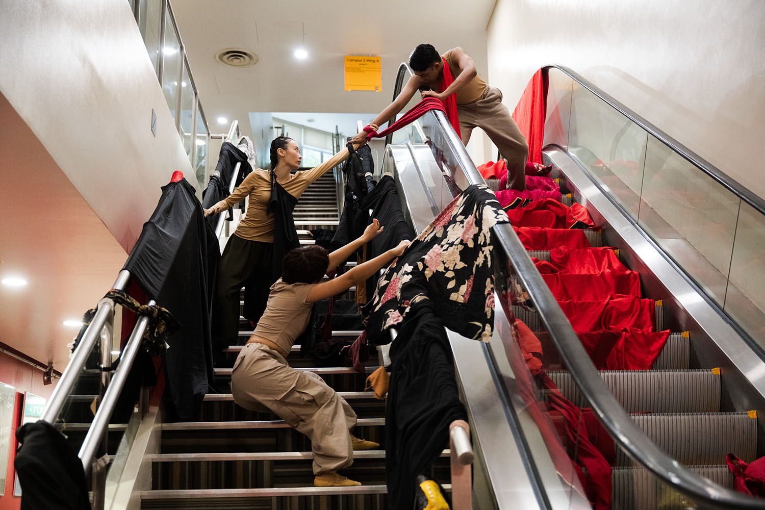 Installation and performance art performed across two short escalators.