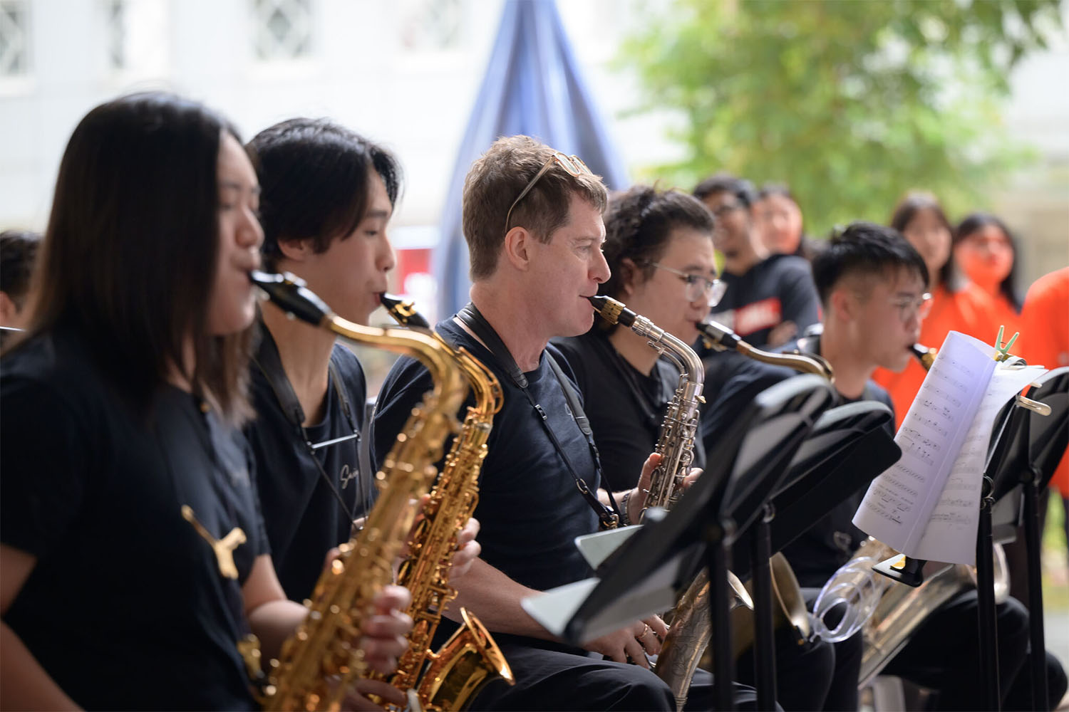 A quadruple of saxophone players.