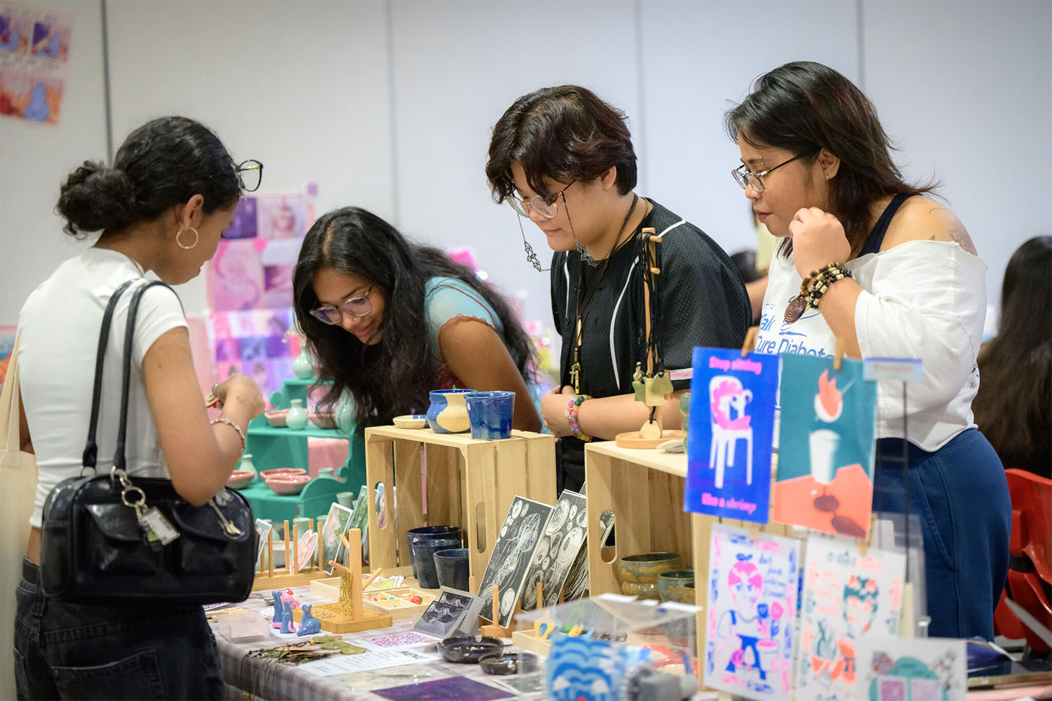 Exhibitors showcasing crafted works of art at NAFA Open House 2025.